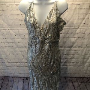 Silver sequin party dress with a long slit